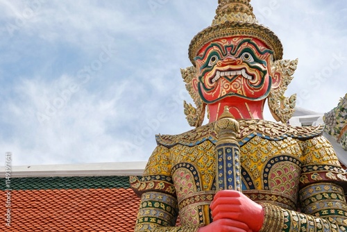 Fotografija Close-up of Suriyaphop, a yaksha (giant) guardian statue with bamboo shoot crown