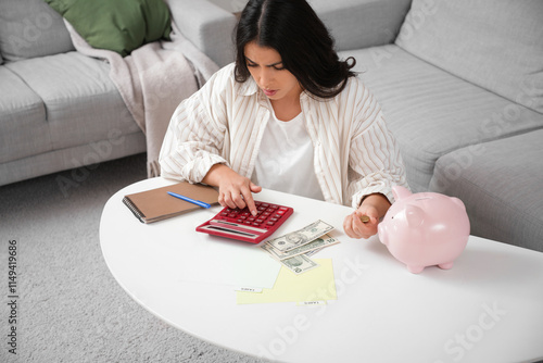 Tired young woman with pigg...