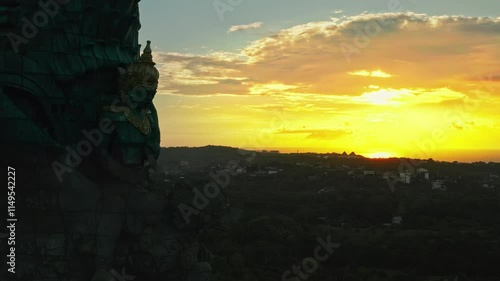 Bali's Most Iconic Landmark Hindu God Garuda Wisnu Kencana statue also GWK statue is a 122-meter tall statue located in Garuda Wisnu Kencana Cultural Park, Bali, Indonesia photo