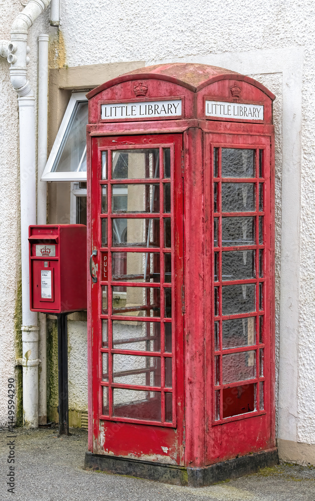 Red mailbox and telephone booth in Scotland Red mailbox and telephone booth in Scotland