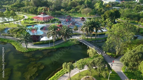 aerial view of kuala lumpur in the background with beautiful morning lark park scenery people jog