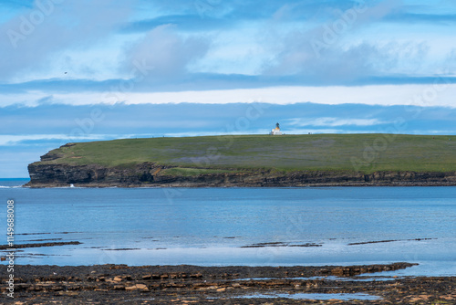 Close-up of Brough of Birsay with lighthouse and tidal pools photo