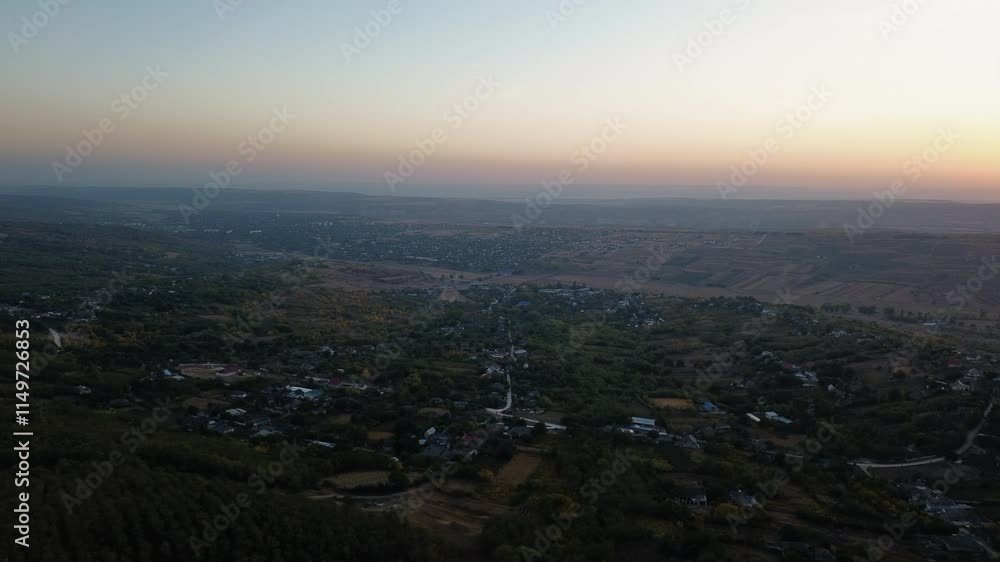 The village seen from above at risen. Landscape filmed with a drone at risen. The village seen from above at risen. Landscape filmed with a drone at risen.