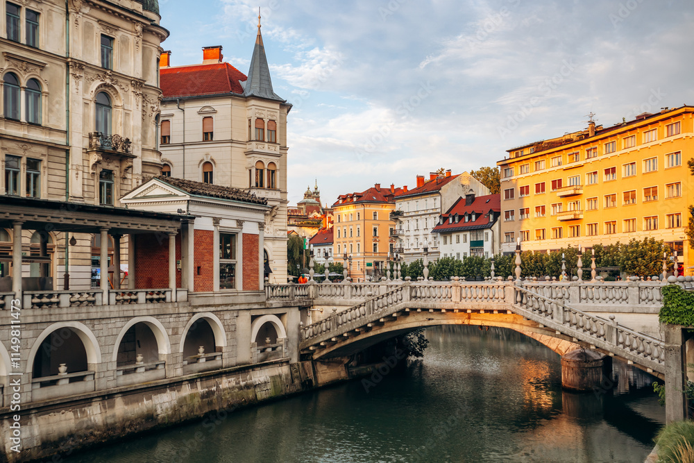 Naklejka premium Ljubljana, Slovenia - 14 August 2024: Preseren Square, the central square in Ljubljana. It is part of the old town pedestrian zone and a major meeting point