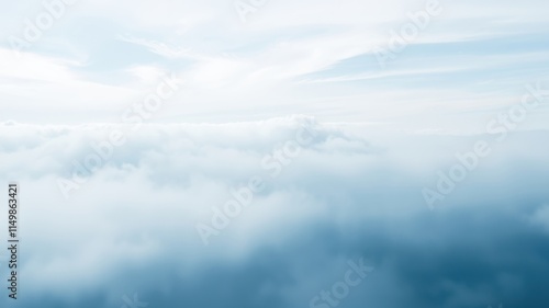 Fototapeta Naklejka Na Ścianę i Meble -  Serene aerial view of a boundless expanse of fluffy white clouds and a soft blue sky above