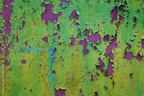 green and purple background close-up, in the photo a wall painted in green and purple background photo