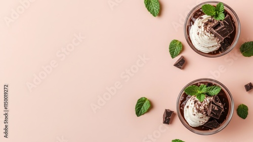 Wallpaper Mural Two chocolate mousse desserts with whipped cream and mint garnish on pink background. Torontodigital.ca