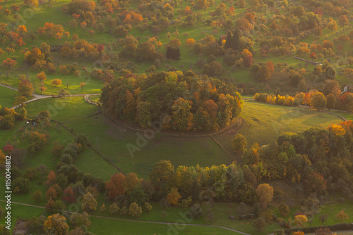 Vulkanembryo Hohbölle im Herbst. Herbstkleid über den Streuobstwiesen auf der Schwäbischen Alb. photo