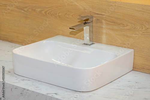 Modern Ceramic Wash Basin With Stainless Steel Faucet Water Tap photo