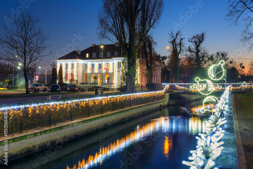 Christmas lights over the Radunia canal in Pruszcz Gdanski at dusk, Poland. photo