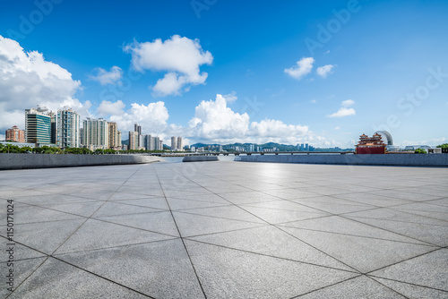 Empty square floor and city skyline with modern buildings scenery in Zhuhai, China. Outdoor city background. photo