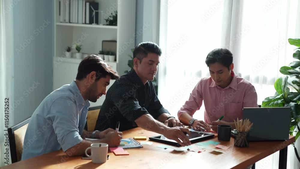 Group of diverse people sharing idea while writing at sticky notes. Professional smart business team brainstorming idea and planning strategy for startup project while wear casual outfit. Convocation. Group of diverse people sharing idea while writing at sticky notes. Professional smart business team brainstorming idea and planning strategy for startup project while wear casual outfit. Convocation.