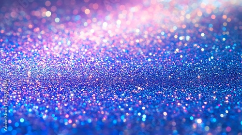 A futuristic abstract background with tiny, glowing colored particles creating a sleek, textured surface. The grains shimmer with neon blues, purples, and silvers, forming a high-tech, digital-like pa photo