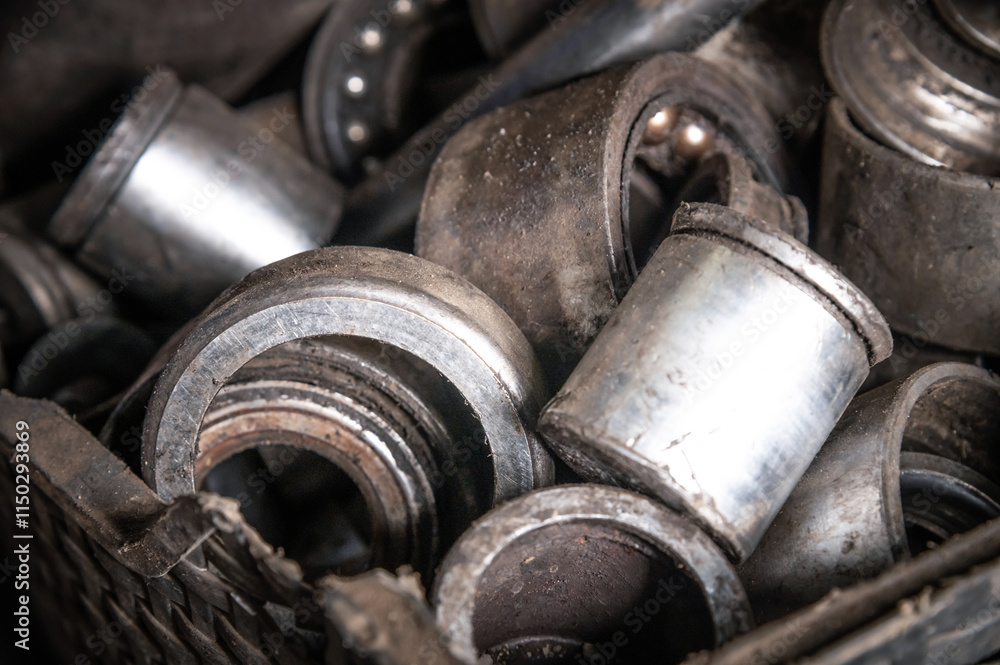 old rusty gears, heavy industry. used scrap metal, spare parts warehouse, waste dump close up old rusty gears, heavy industry. used scrap metal, spare parts warehouse, waste dump close up