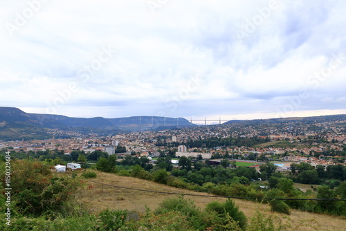 aerial view over the city of Millau with the Viaduct in the background, France, Europe photo