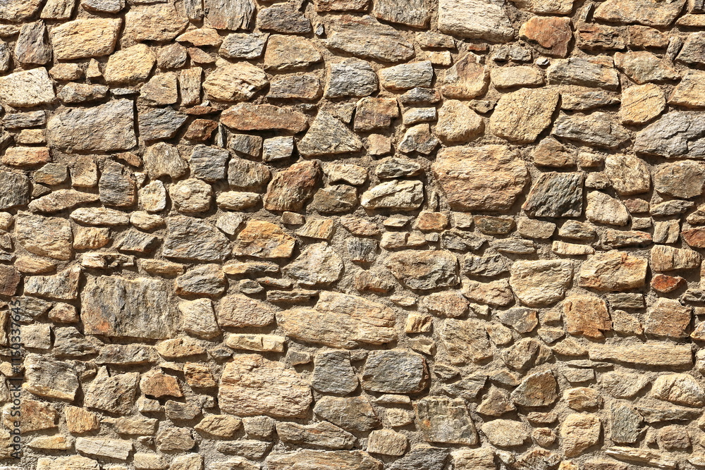 yellow beige sand color stone brick vertical wall yellow beige sand color stone brick vertical wall