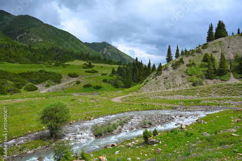 Mountains views of meadows and rivers on a summer cloudy day , Kazakhstan, Kegen, Aktas mount, Tekes river.