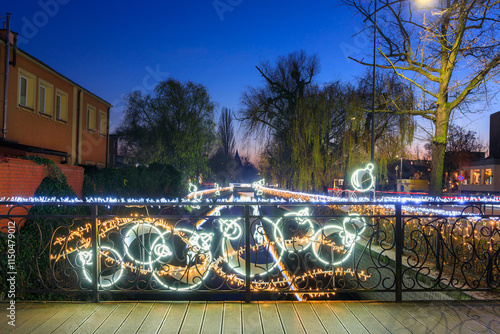 Christmas lights over the Radunia canal in Pruszcz Gdanski at dusk, Poland. photo