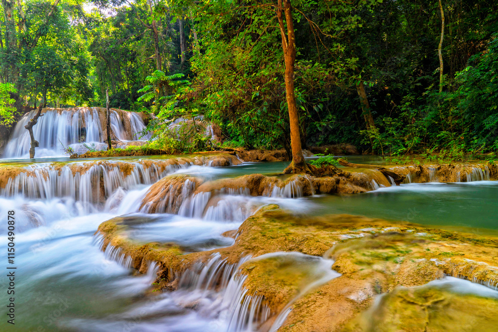 Travel and tourism in Asia. Luang Prabang, Laos. Kuang Si Waterfalls. Beautiful and largest park with cascades of waterfalls in Laos
Travel and tourism in Asia. Luang Prabang, Laos. Kuang Si Waterfalls. Beautiful and largest park with cascades of waterfalls in Laos