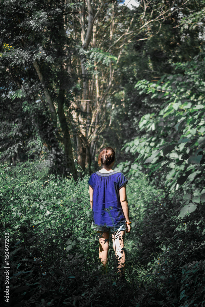 woman walking forward on the path to her intended destination and her journey along the path is a good exercise. feet walking along the path is the concept of walking to her destination and success. woman walking forward on the path to her intended destination and her journey along the path is a good exercise. feet walking along the path is the concept of walking to her destination and success.