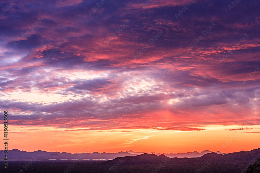 A beautiful sunset with a pink and orange sky A beautiful sunset with a pink and orange sky
