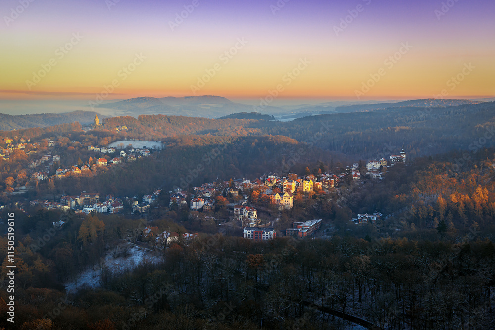 Obraz premium Aerial panorama over Thuringian city Eisenach from Wartburg Castle in winter.