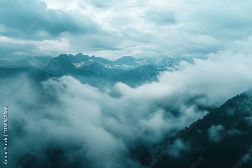 Mountain Peaks Enveloped In A Sea Of Clouds Mountain Peaks Enveloped In A Sea Of Clouds
