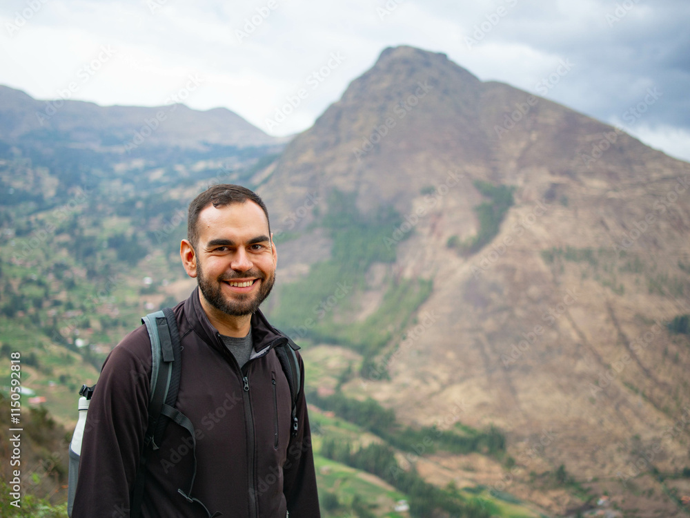portrait of a bearded man tourist in Chinchero sacred valley of incas Peru portrait of a bearded man tourist in Chinchero sacred valley of incas Peru