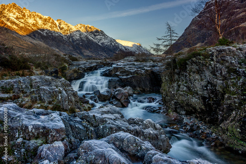 Clachaig Falls Glencoe in winter with the Aonach Eagach Ridge