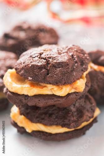 Soft brownie cookies with peanut butter cream filling 