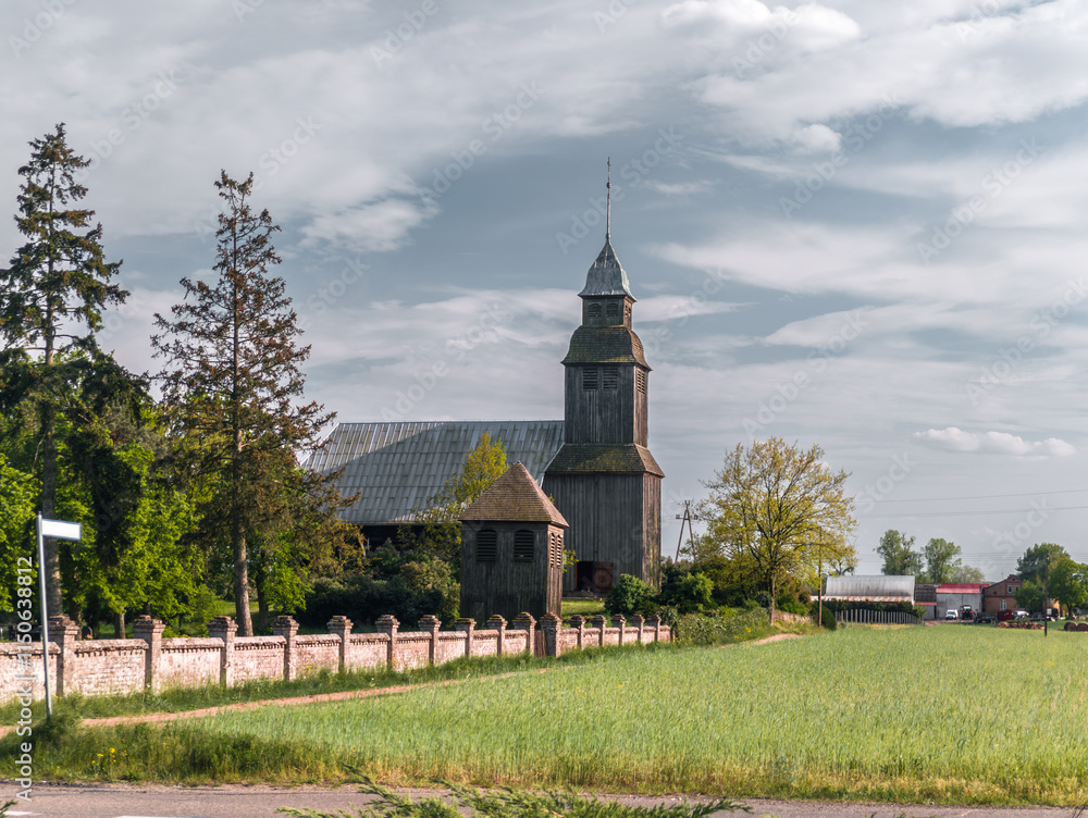 Old wooden catholic church in Nowe Dwory village (Kościół św. Jana Crzciciela in Nowe Dwory). Powiat czarnkowsko-trzcianecki, Wielkopolska, Poland
