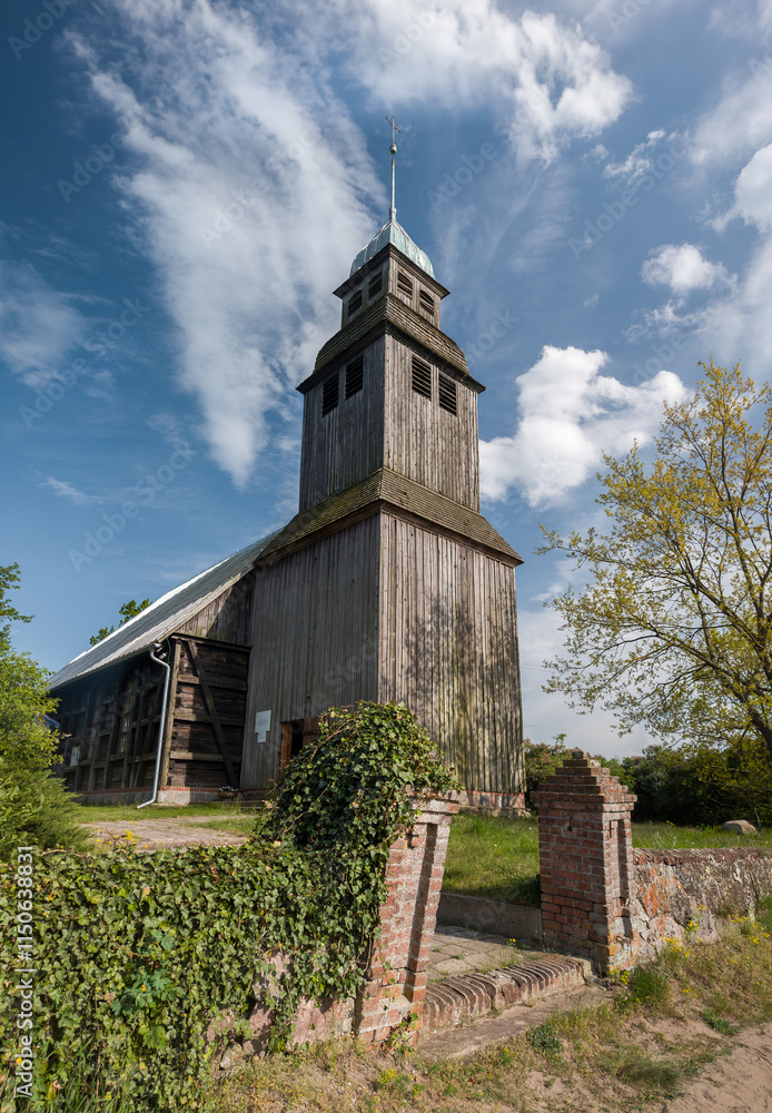 Old wooden catholic church in Nowe Dwory village (Kościół św. Jana Crzciciela in Nowe Dwory). Powiat czarnkowsko-trzcianecki, Wielkopolska, Poland