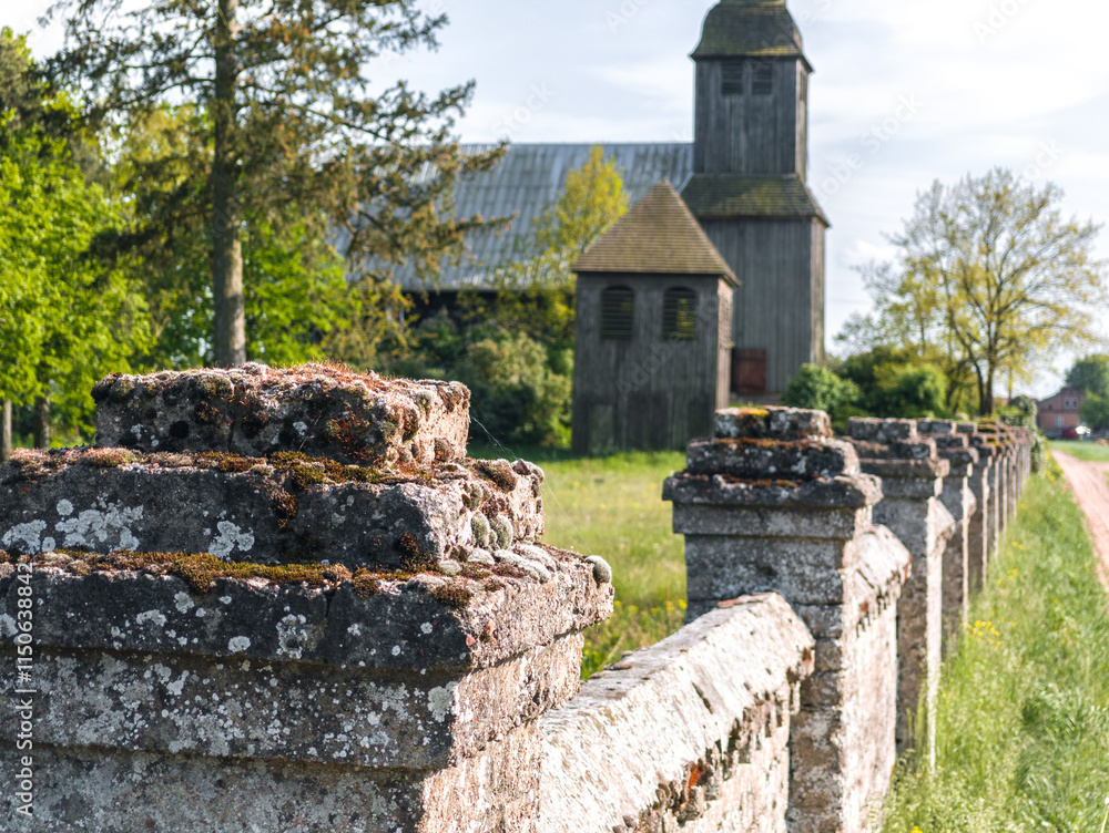 Old wooden catholic church in Nowe Dwory village (Kościół św. Jana Crzciciela in Nowe Dwory). Powiat czarnkowsko-trzcianecki, Wielkopolska, Poland