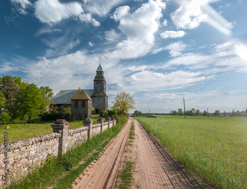 Obraz na płótnie Old wooden catholic church in Nowe Dwory village (Kościół św. Jana Crzciciela in Nowe Dwory). Powiat czarnkowsko-trzcianecki, Wielkopolska, Poland w salonie