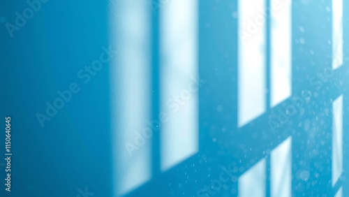 Panoramic abstract blue background for product presentation with sunlight and blurred shadows wall. Winter background.