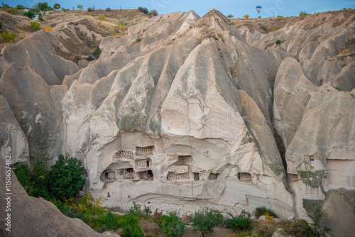Obraz na płótnie Fairy Chimneys are world-famous natural formations located in the Cappadocia region of Turkey. They were formed by the wind and water erosion of volcanic tuff layers over thousands of years. w salonie
