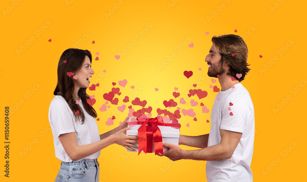 A couple celebrates their love by exchanging a beautifully wrapped gift, surrounded by colorful heart shapes, embodying joy and affection on Valentine's Day. A couple celebrates their love by exchanging a beautifully wrapped gift, surrounded by colorful heart shapes, embodying joy and affection on Valentine's Day.