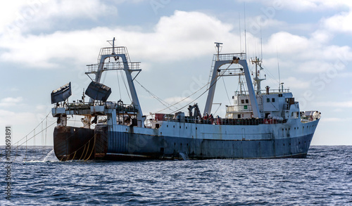 Fishing vessel lifts a trawl tackle off the southern tip of Africa.