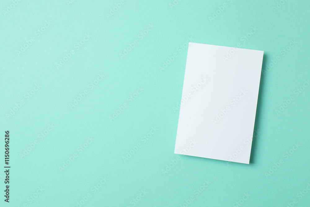 Paper card on color background. Empty greeting card for text design Paper card on color background. Empty greeting card for text design