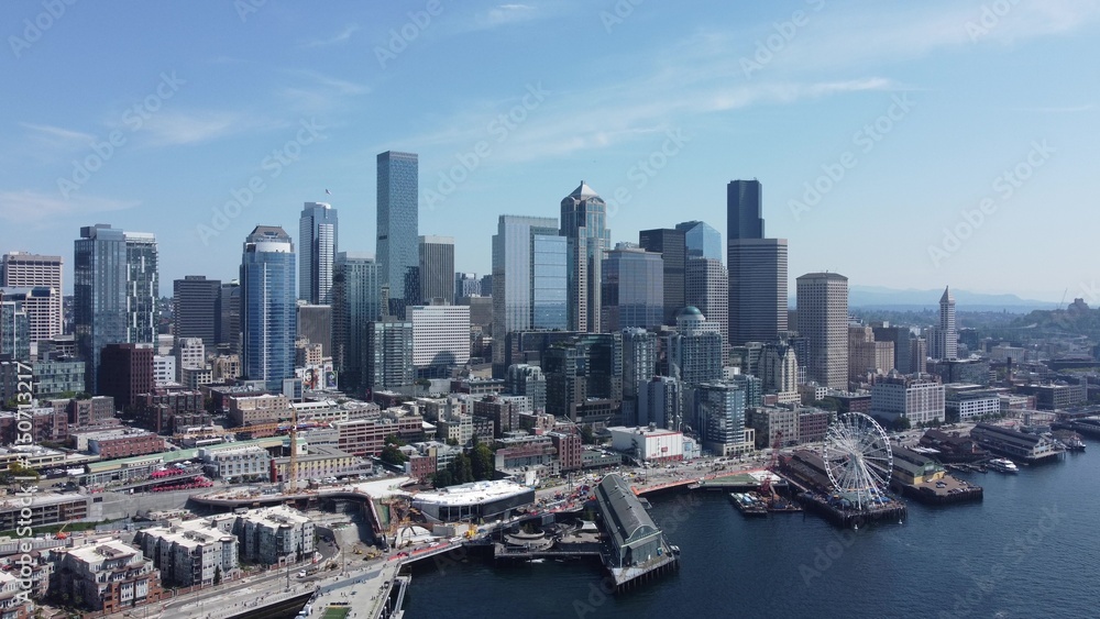 Aerial View of a Vibrant Modern City Skyline Near Waterfront