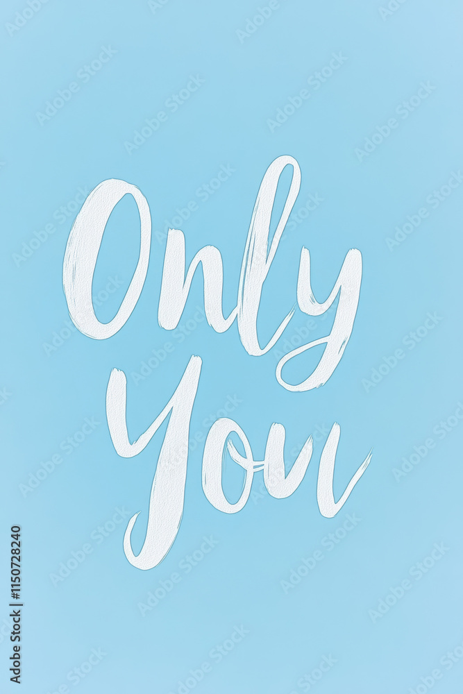 Fototapeta premium Inspirational text artwork featuring the phrase Only You on a light blue background to encourage self-love and individuality