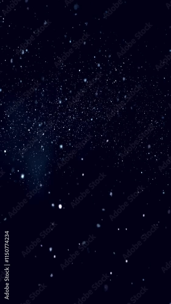 Abstract white random dotted pattern resembling snow on dark blue background, vertical video
Abstract white random dotted pattern resembling snow on dark blue background, vertical video