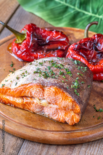 Baked Salmon with Bell Peppers on Rustic Wooden Cutting Board