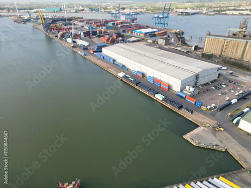 Tilbury City Centre and Docks on River Thames, borough of Thurrock, Essex, England, United Kingdom. Aerial View Was Captured with Drone's Camera on April 20th, 2024 photo