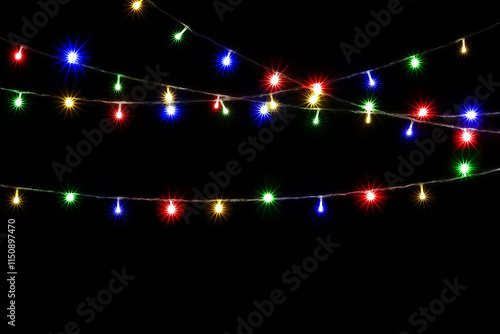 Christmas and New Year Decoration Lights, Garland with Small  Led Lamps Shining on Black Background.