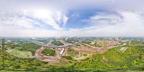 Aerial view of Thu Duc city 2024, Ho Chi Minh city-Vietnam with apartment and building real estate projects, river. Aerial view of Saigon city with blue sky and sun. Fly-cam landscape photo