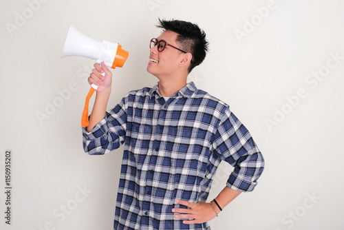 Side view of a man announce good news using megaphone photo