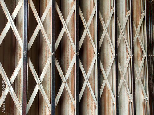 Background of the reinforcement of the folding gate which has started to rust