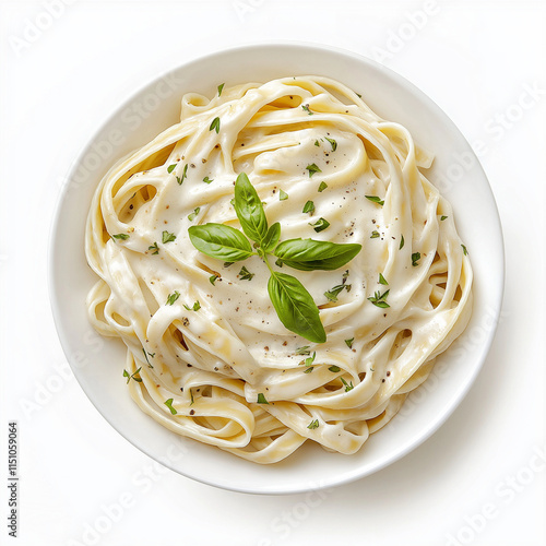 Top view Creamy Alfredo fettuccine pasta on a white plate isolated on a white background