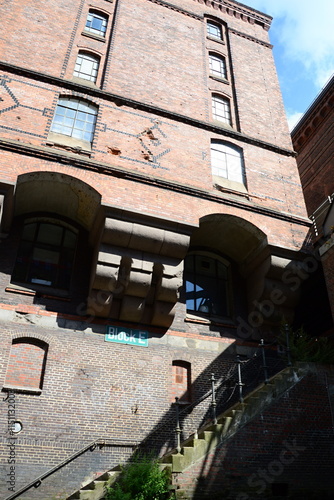 Historical Warehouse in the Neighborhood Speicherstadt in the Hanse City Hamburg photo